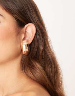 stud earrings with clean bubble oval design in gold tone