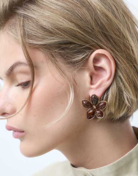 ASOS DESIGN stud earrings with flower design in brown resin - view 1