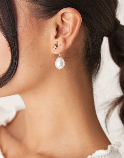 ASOS DESIGN stud earrings with front-to-back faux pearl design in gold tone - view 1