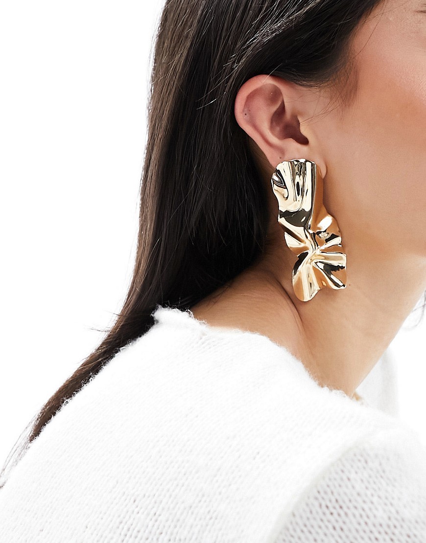 ASOS DESIGN stud earrings with hammered abstract design in gold tone