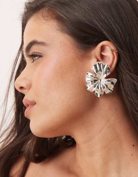 ASOS DESIGN stud earrings with hibiscus floral design in silver tone - view 1