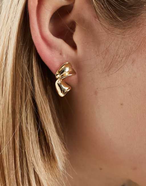 ASOS DESIGN stud earrings with molten curved design in gold tone