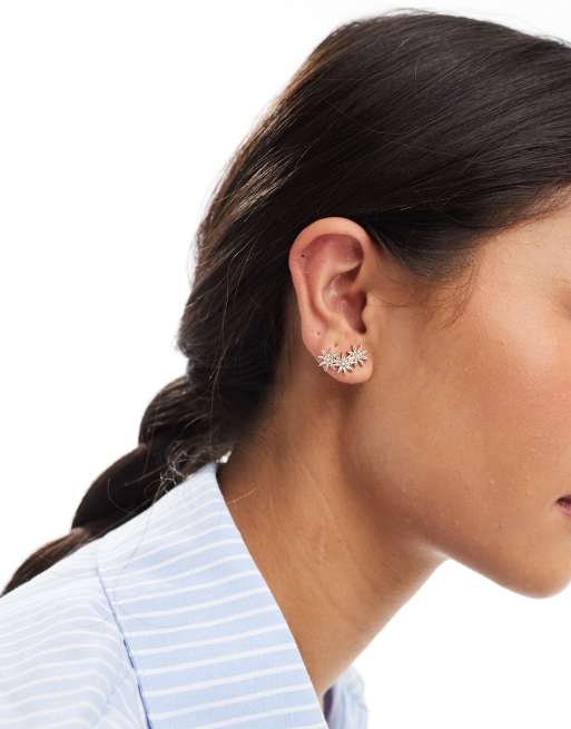 ASOS DESIGN stud earrings with multi star stud detail in gold tone ASOS