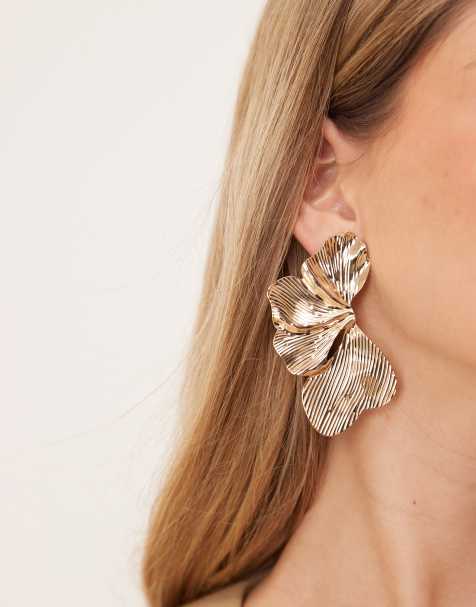 ASOS DESIGN stud earrings with oversized floral petal detail in gold tone - view 1