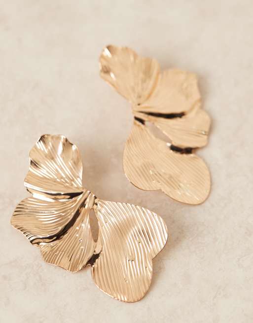 ASOS DESIGN stud earrings with oversized floral petal detail in gold tone, 3 of 3