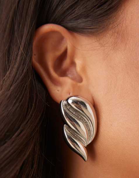 ASOS DESIGN stud earrings with sculptural design in silver - view 1