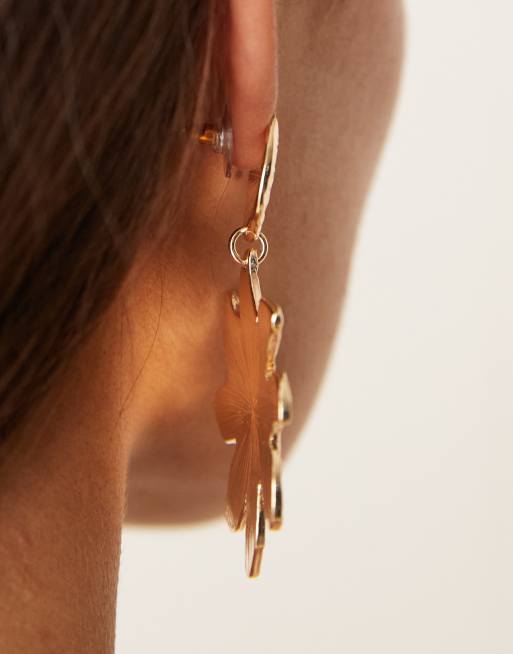 ASOS DESIGN stud earrings with star pendant design in hammered gold tone
