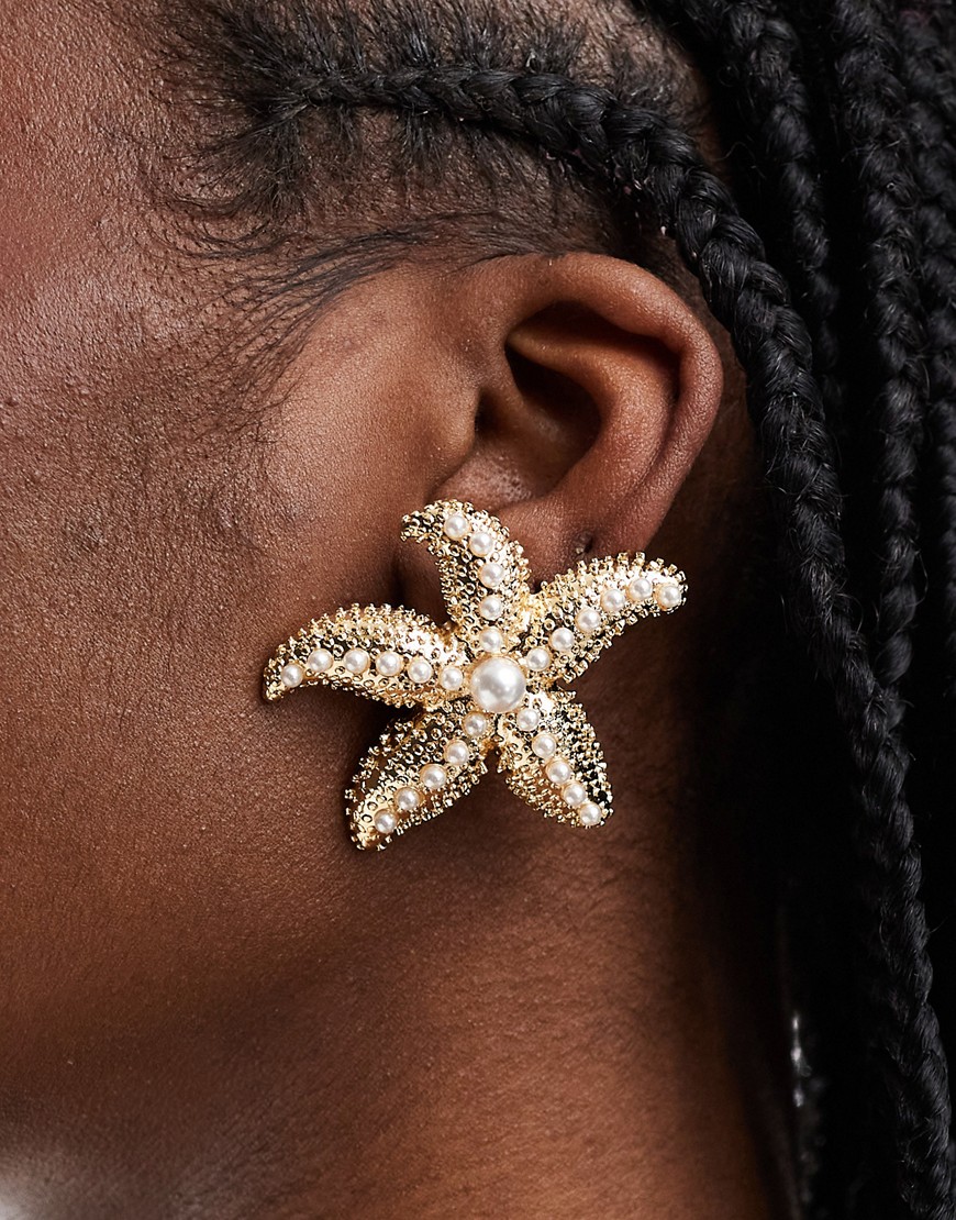 ASOS DESIGN stud earrings with starfish faux pearl design in gold tone