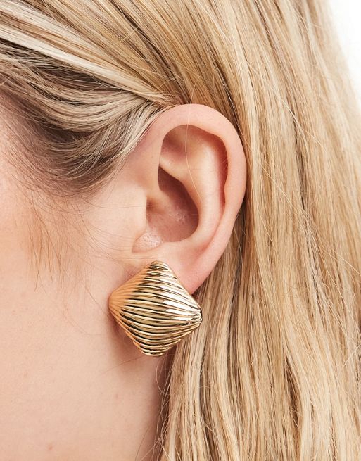 FhyzicsShops DESIGN stud earrings with textured design in gold tone