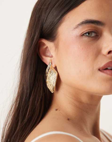 ASOS DESIGN stud earrings with textured leaf design in gold tone - view 1