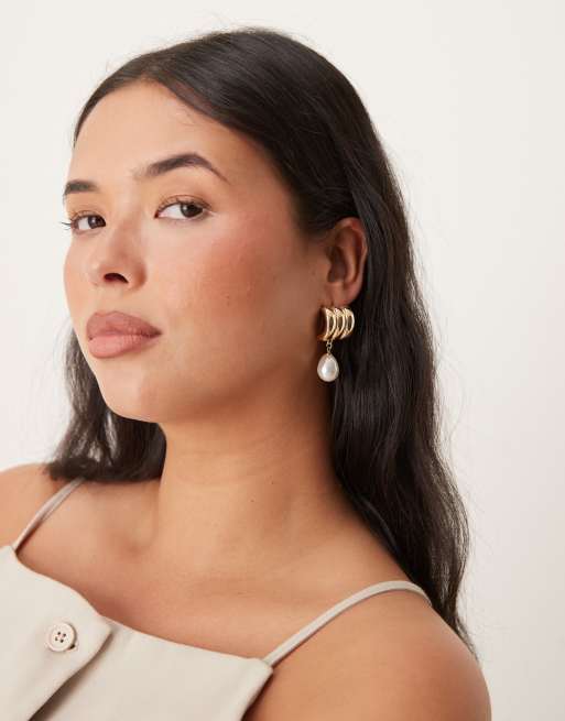 ASOS DESIGN stud earrings with triple row detail and faux pearl drop in gold tone