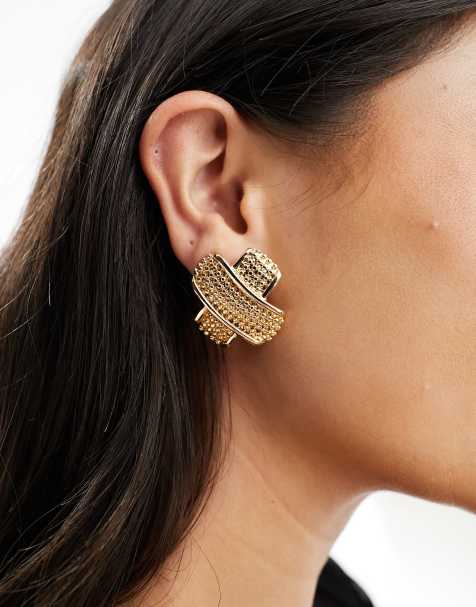 ASOS DESIGN stud earrings with vintage look cross over design in gold tone