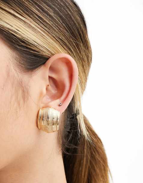 ASOS DESIGN stud earrings with vintage look curved ridged detail in gold tone - view 1