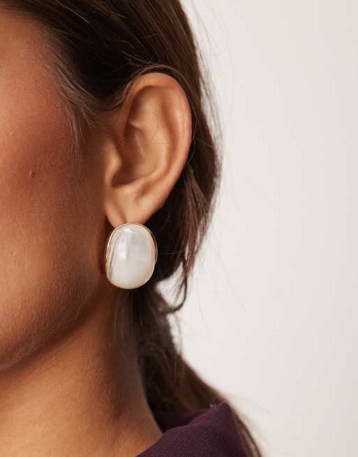 ASOS DESIGN stud earrings with white resin and gold detail