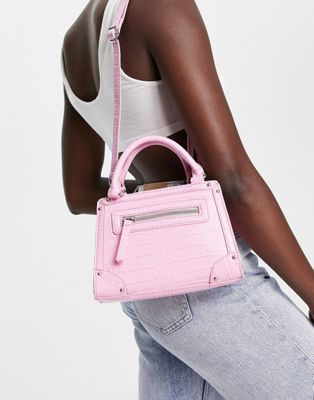 ASOS DESIGN studded winged tote bag with top handle and detachable crossbody strap in pink croc
