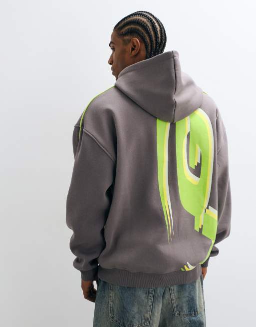ASOS DESIGN sudadera con capucha extragrande con ribetes y estampado en gris carbón, 2 de 5