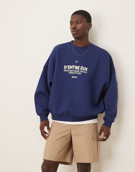 ASOS DESIGN sudadera extragrande con estampado en el pecho en azul marino, 3 de 4
