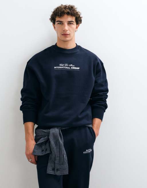 ASOS DESIGN sudadera extragrande premium de tejido grueso con estampado en el pecho en azul marino, 2 de 10