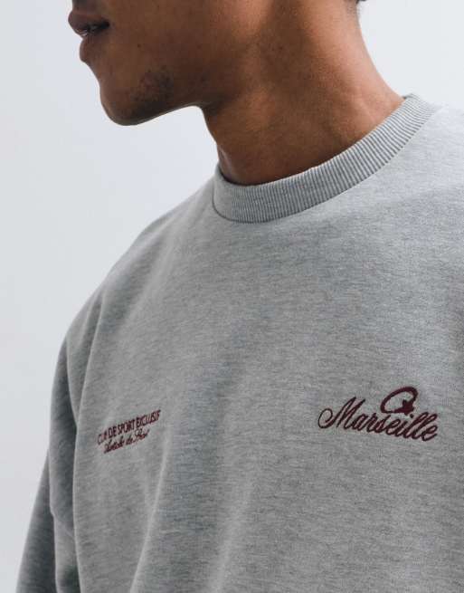 ASOS DESIGN - Sudadera gris jaspeado ultragrande con estampado de texto, 3 de 5