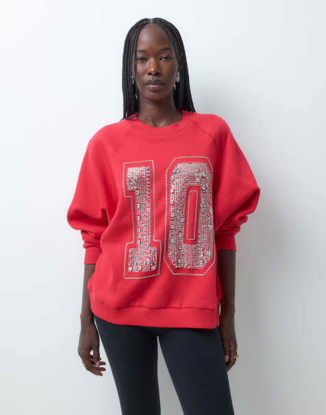 ASOS DESIGN - sudadera oversize con manga raglán y número varsity adornado con cristales en rojo - view 1