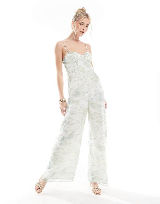 ASOS DESIGN – Suddigt djurmönstrad och panelsydd jumpsuit med korsett, råskurna kanter och utskurna detaljer