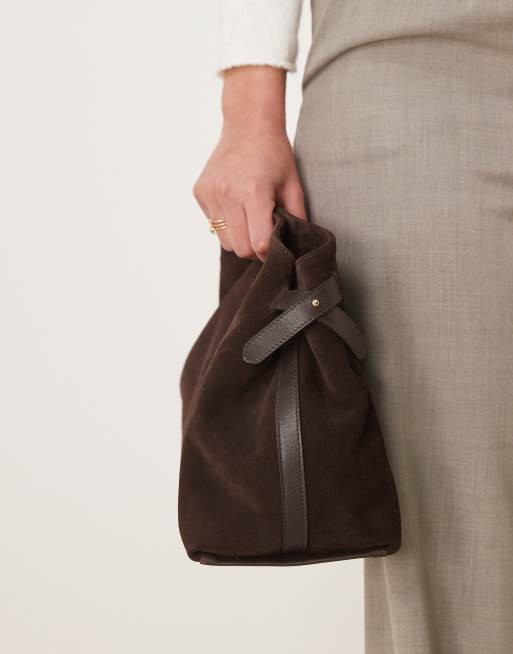 ASOS DESIGN suede belted crossover clutch bag in brown