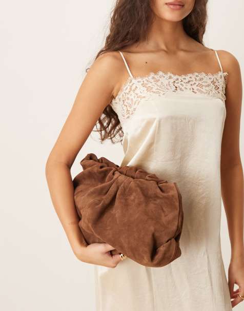 ASOS DESIGN suede cloud clutch bag in chocolate - view 1