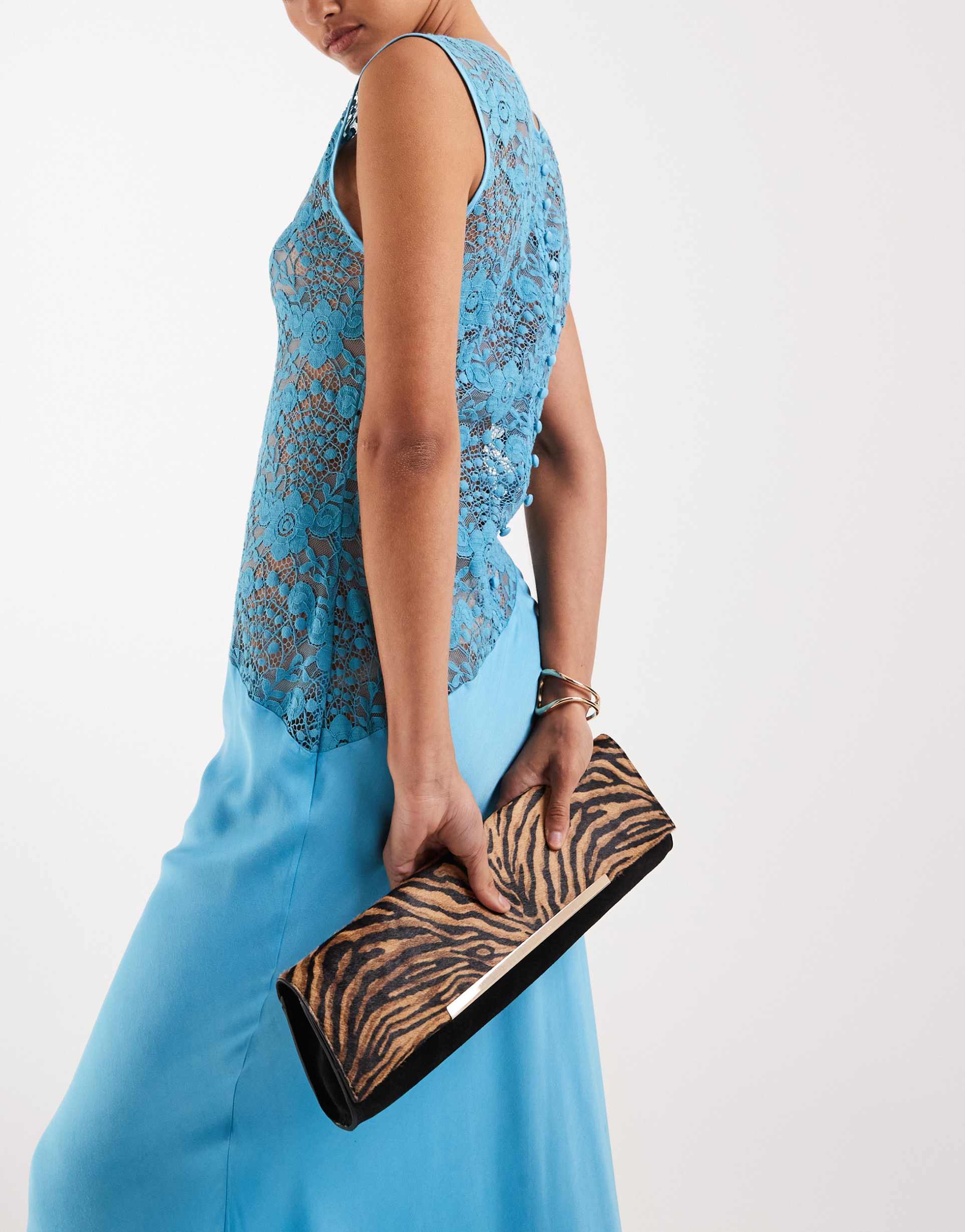 asos design suede & hair on real leather with tiger print elongated clutch bag with bar detail