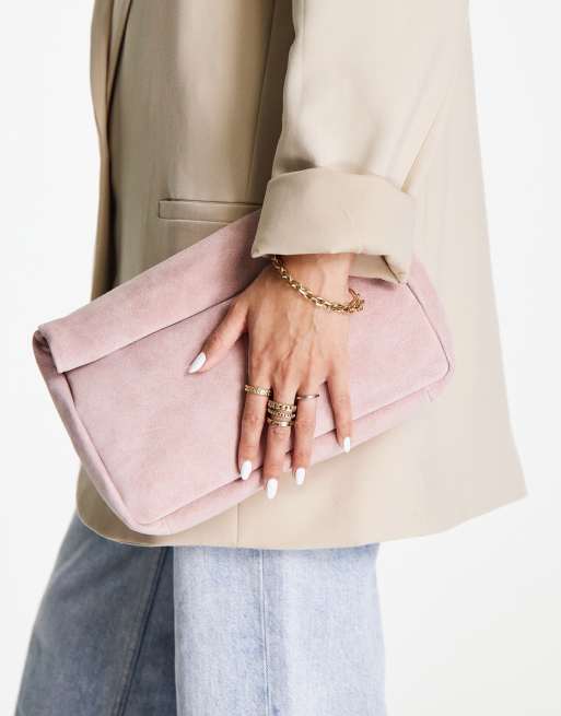 ASOS DESIGN suede roll top clutch bag in pink ASOS