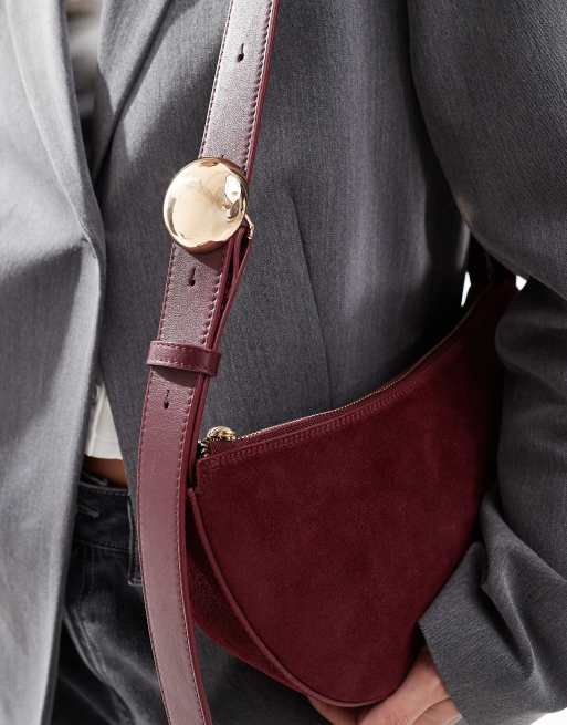 ASOS DESIGN suede sling crossbody bag with dome hardware detail in burgundy, 3 of 4