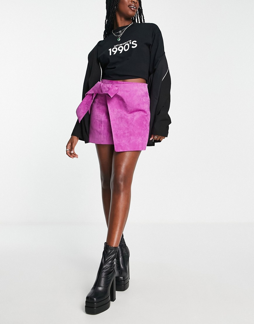 ASOS DESIGN suede wrap mini skirt with tie detail in magenta-No color