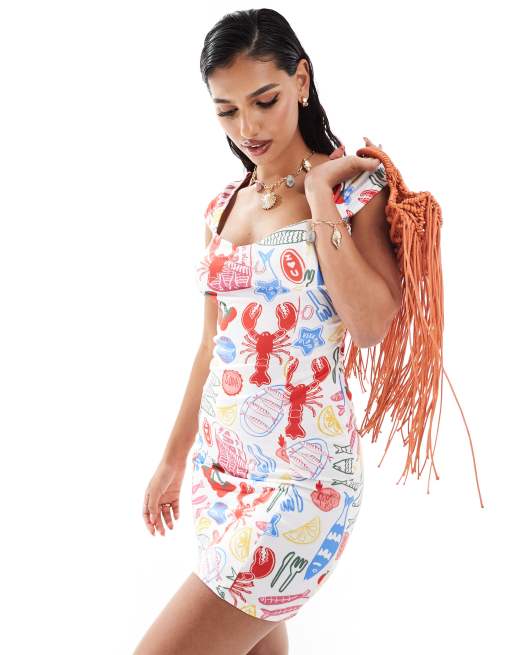 ASOS DESIGN – Sukienka mini z dekoltem w kształcie serca we wzór