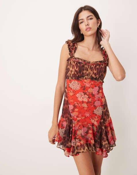 ASOS DESIGN – Sukienka mini z nadrukiem w kwiaty i w zwierzęcy wzór ze skośnymi krótkimi rękawami, falbankami i kontrastową wstążką - view 1