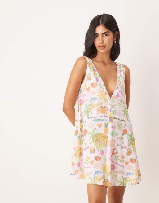 ASOS DESIGN – Sukienka o prostym kroju z głębokim dekoltem w szpic w tropikalny wzór