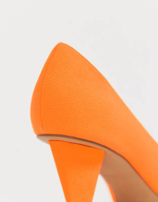 neon orange pumps