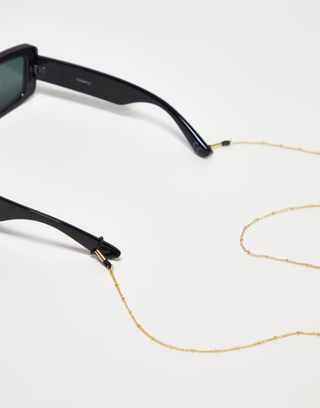 ASOS DESIGN sunglasses chain with dot dash design in gold tone