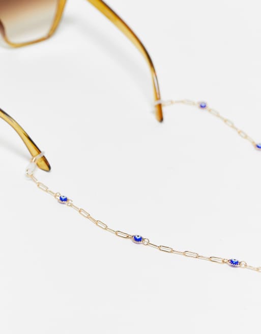 ASOS DESIGN sunglasses chain with eye detail in gold tone 