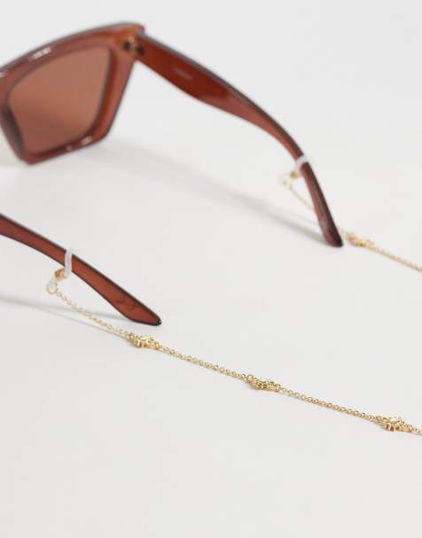 ASOS DESIGN sunglasses chain with mini-sun design in gold tone - view 1