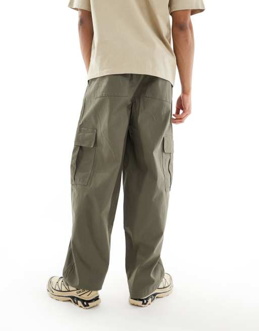 ASOS DESIGN loose cargo pants with elasticized waist in washed green