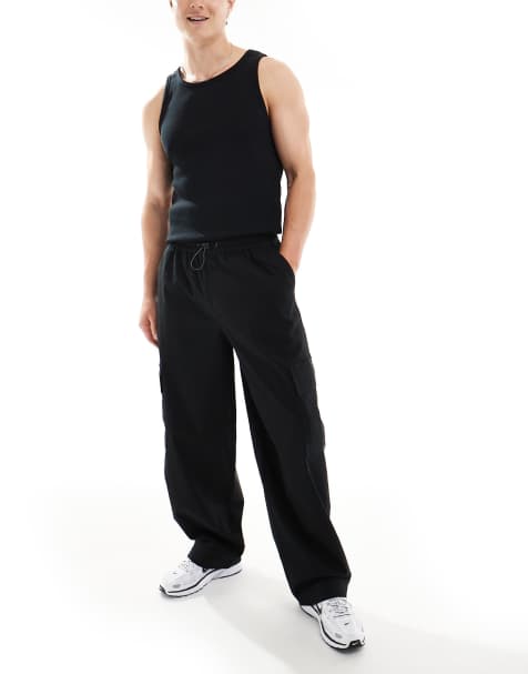 ASOS DESIGN super baggy cargo trousers with elasticated waist in black - view 1