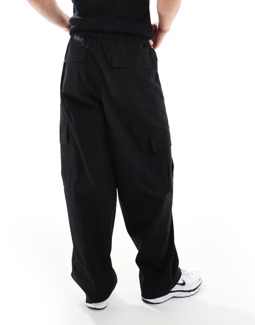 ASOS DESIGN - Super baggy cargobroek met elastische taille in zwart, 4 van 5
