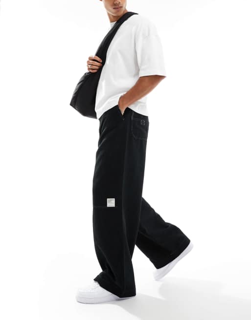 ASOS DESIGN super baggy cord trouser with contrast stitch in black  