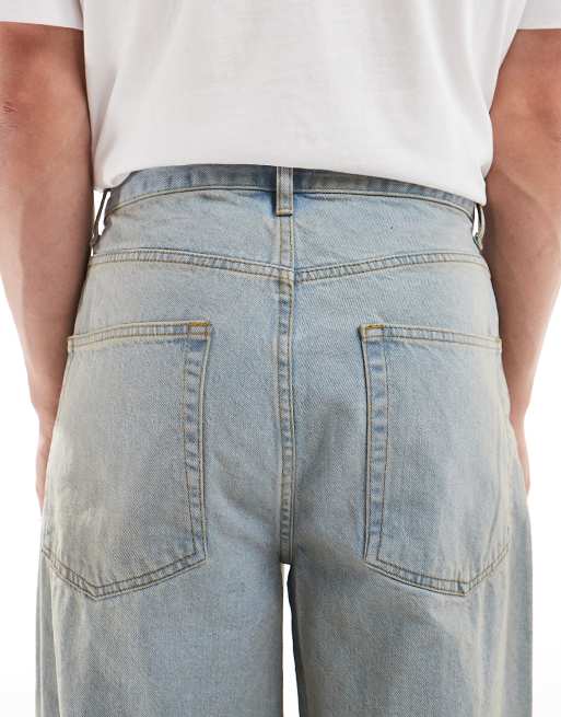 ASOS DESIGN super baggy fit jeans with a tint in light wash blue
