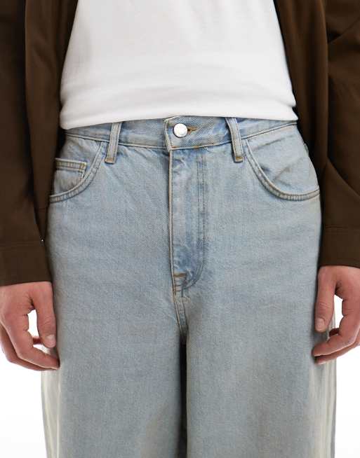 ASOS DESIGN super baggy fit jeans with a tint in light wash blue