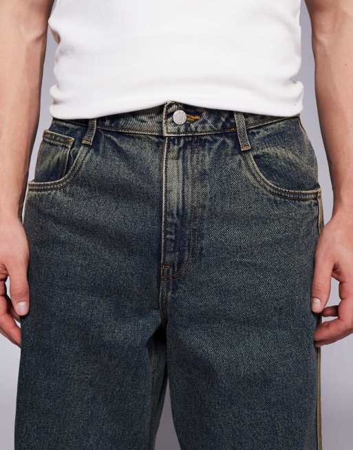 ASOS DESIGN super baggy fit jeans with sporty detail in mid wash blue