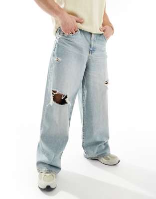 ASOS DESIGN super baggy jeans in light wash with ribs & abrasions 