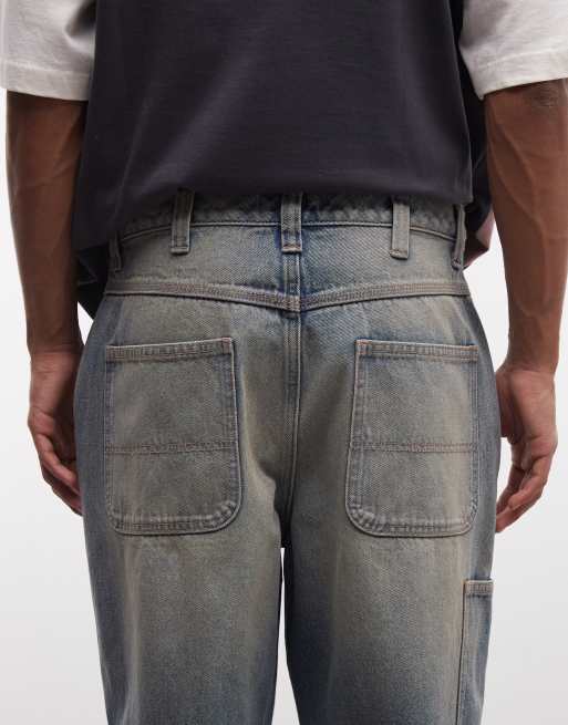 ASOS DESIGN - Super baggy jeans in mid-wash blauw met tint, 4 van 5