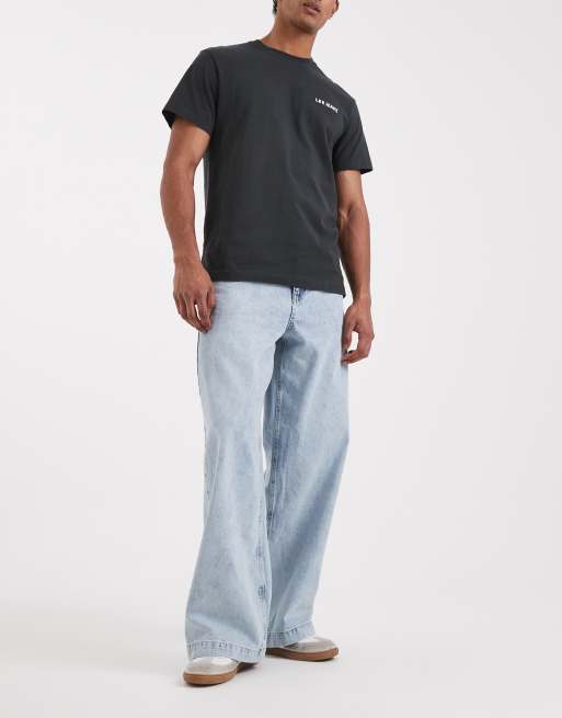 ASOS DESIGN - Super baggy jeans in mid-wash blauw
