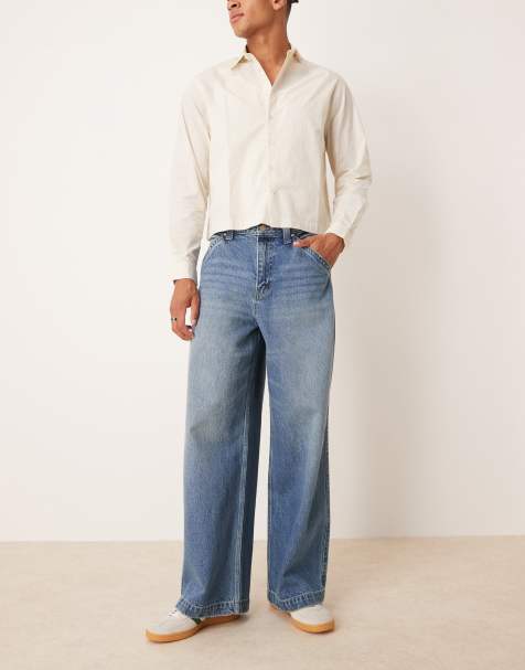 ASOS DESIGN super baggy jeans in mid wash blue with embroidered back pocket - view 1