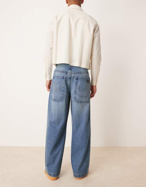 ASOS DESIGN super baggy jeans in mid wash blue with embroidered back pocket